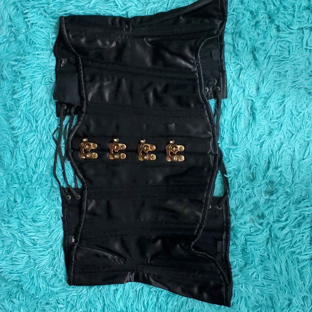 Sleek Black Corset with Gold Clasps
